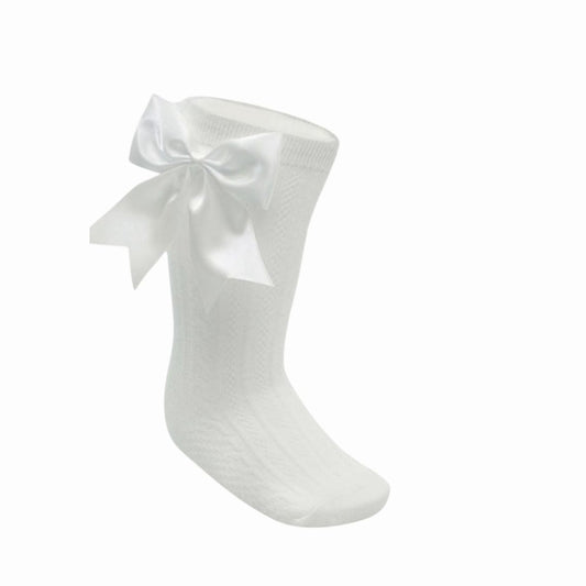 White ribbed knee-high socks with a large bow.