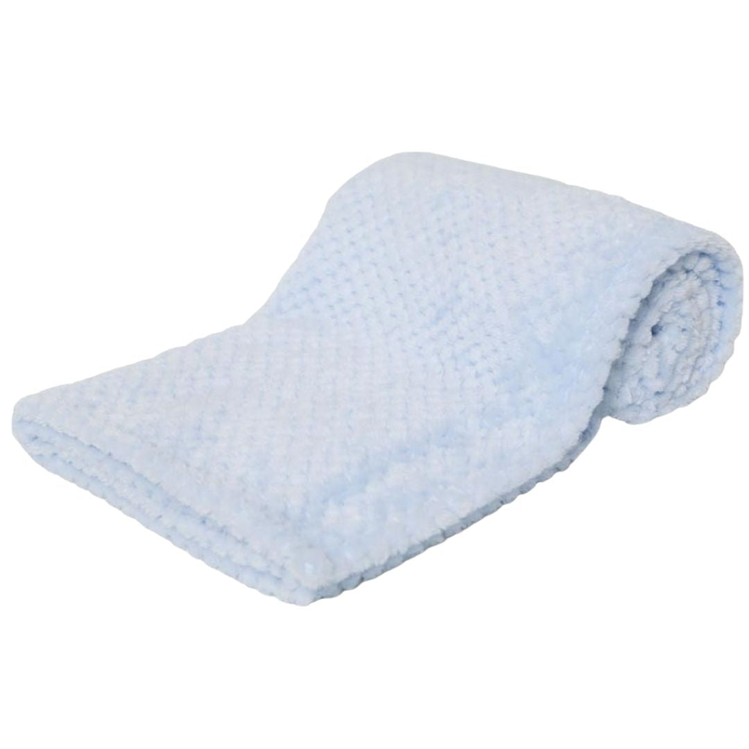 Rolled-up light blue waffle blanket