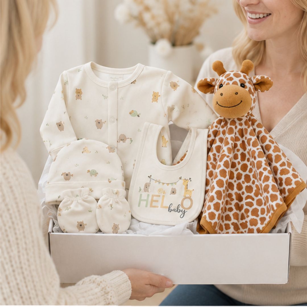Neutral baby gift box hamper presented as a thoughtful gift for new parents