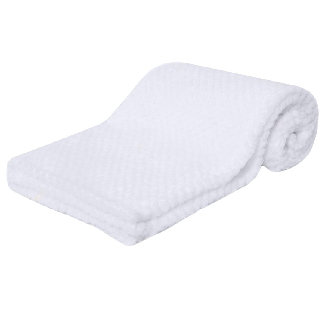 Rolled-up white waffle blanket